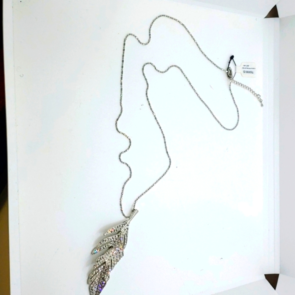 Torrid long necklace with silver rhinestone leaf pendant